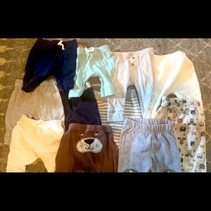 11 pairs of baby boy pants. Sizing from 3 to 12 mo
